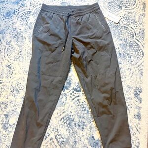 Athleta woman’s Black Trekkie track Pants NEW Large